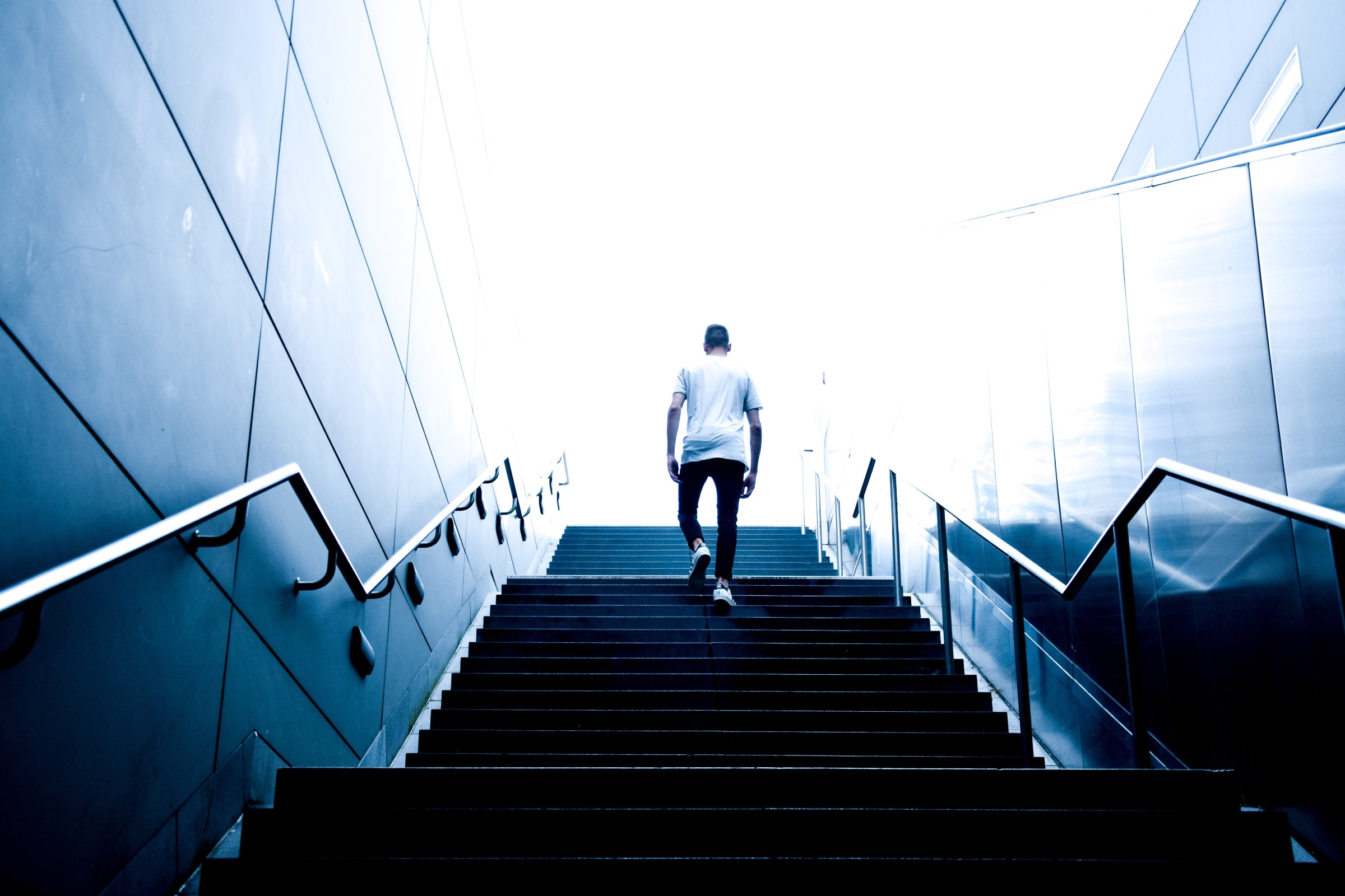 Talent specialist climbing up stairs