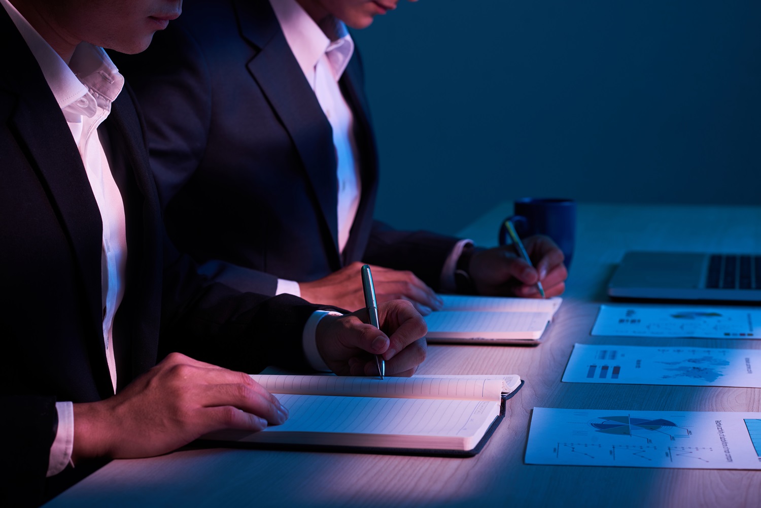 Cropped image of businessmen planning work and company development